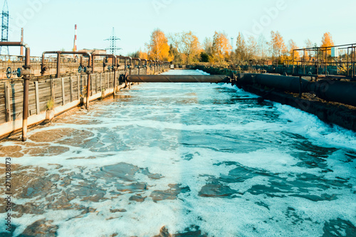 Piece od water surface during complete-mixing activated sludge process.