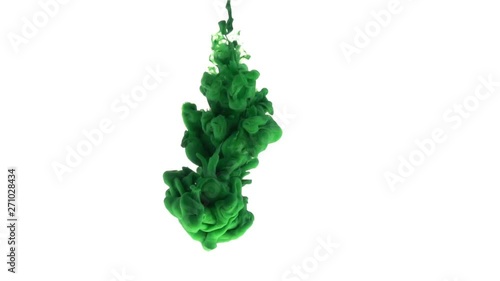 Slow motion of green acrylic paint swirling underwater on white background