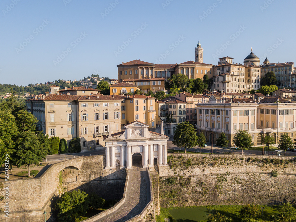 Bergamo, Italy. Drone aerial view of the old gate San Giacomo and historical building. The Old town. One of the beautiful city in Italy
