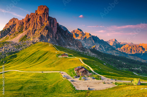 Stunning alpine pass with high mountains at sunset, Dolomites, Italy