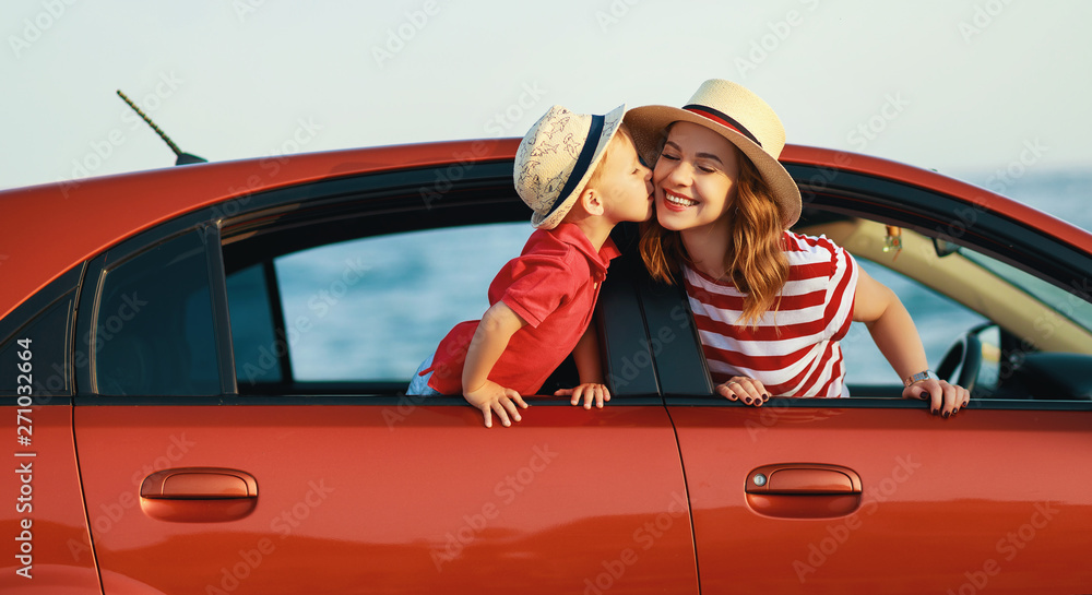 happy family mother and child boy goes to summer travel trip in car.