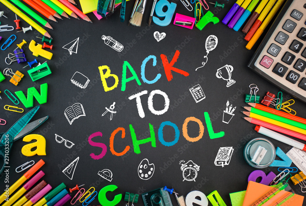 school and office supplies on a black background Back to School concept colorful letters school and office supplies on a black background Back to School concept colorful letters