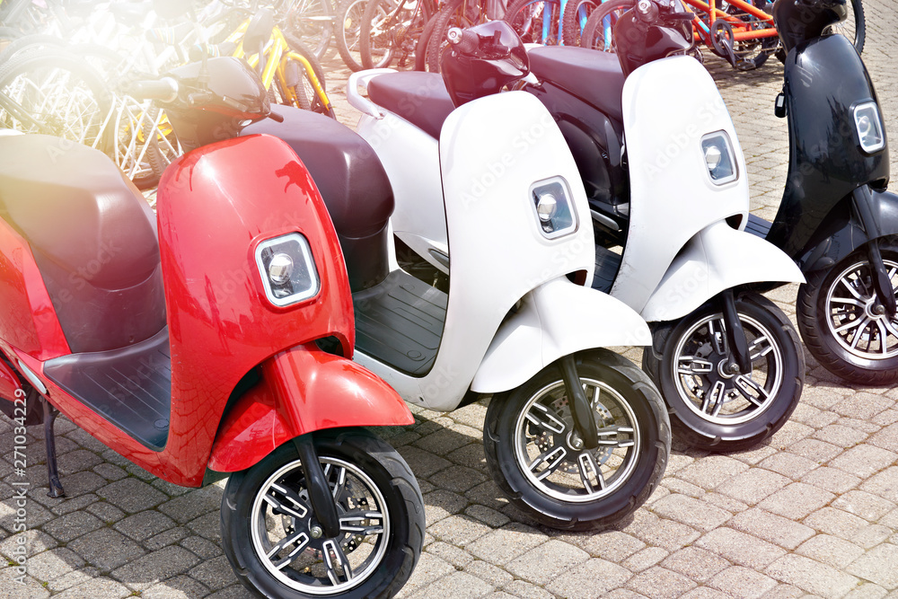 Electric scooters for rent in parking Stock Photo Adobe Stock