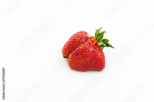 Fresh Strawberry. Imperfect Vegetable. Raw Organic Fruit Closeup Isolated on White. Sweet Red Natural Berry. Vegetarian Nutrition Breakfast Ingredient. Strage Ugly Vitamin Fruit. Fresh and Delicious