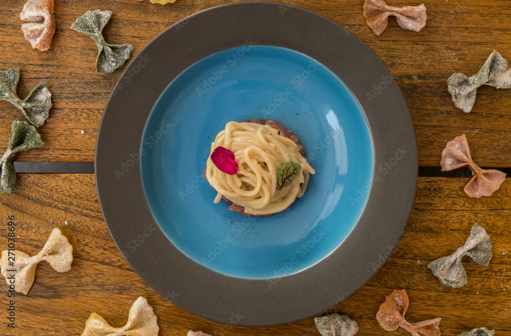 Fototapeta premium Italian gourmet pasta spaghetti. Delicious Mediterranean cuisine. High end italian food