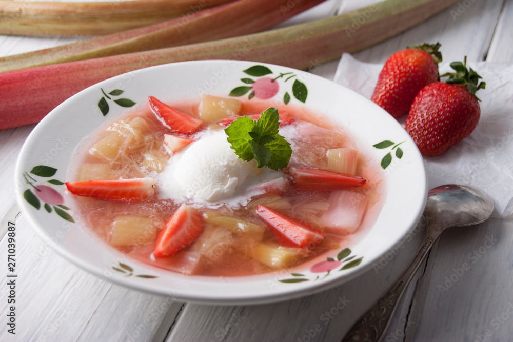Rhubarb soup with strawberries and ice cream in Rhubarb soup with strawberries and ice cream in