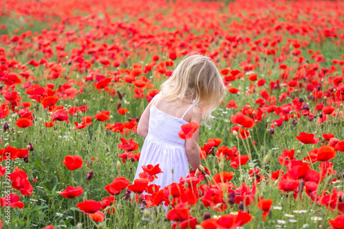happy girl in a flower field