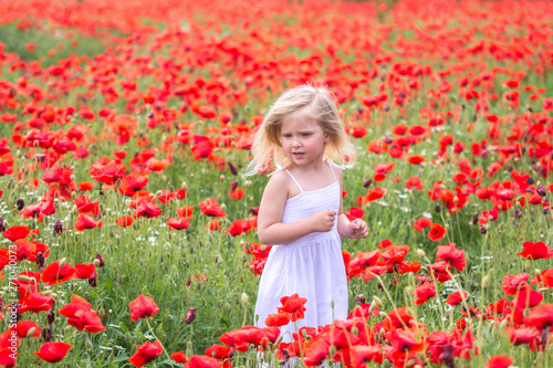 happy girl in a flower field