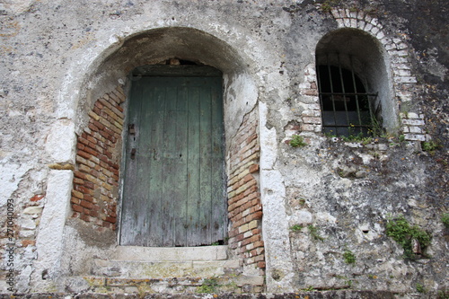 Old Walls And Door Of Ancient Historic Building On Corfu Island Greece