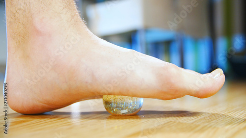 Flat feet sole massage with ball