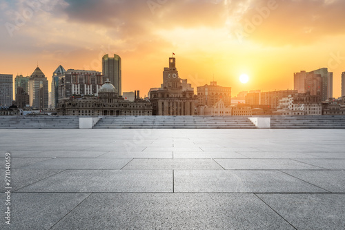 Shanghai bund skyline and empty square floor at sunset