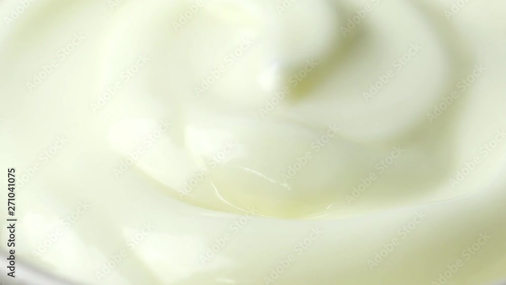 Rotating of closeup shot yogurt in 4K resolution Rotating of closeup shot yogurt in 4K resolution