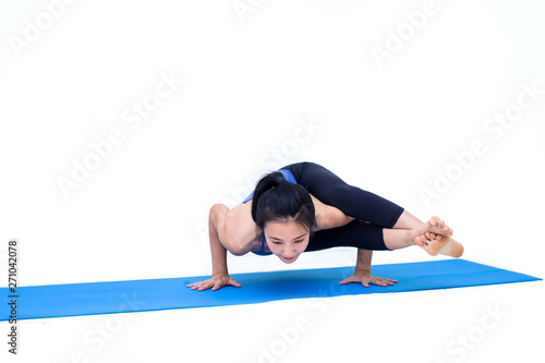 Beautiful Asia girl practicing yoga on isolated white background : Concept practicing