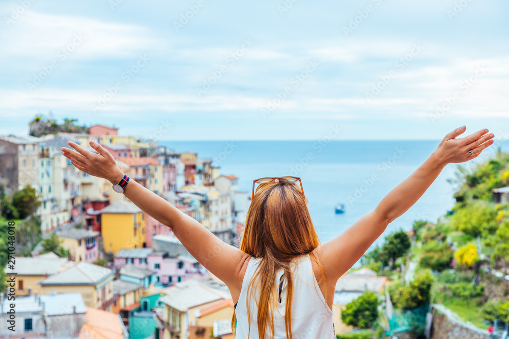 Young woman traveling through Europe, Cinque Terre, Italy Young woman traveling through Europe, Cinque Terre, Italy