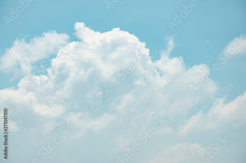 Blue sky and white clouds with blurred background patterns
