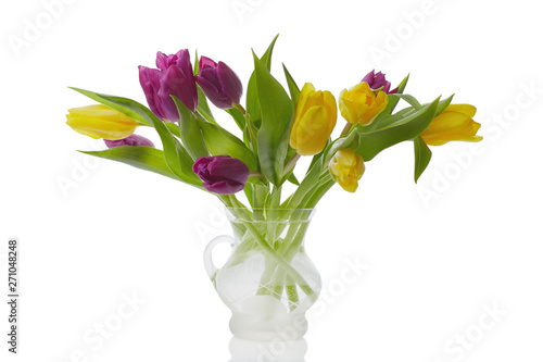 Fototapeta Naklejka Na Ścianę i Meble -  Bouquet of colorful tulips in a jug isolated on white background