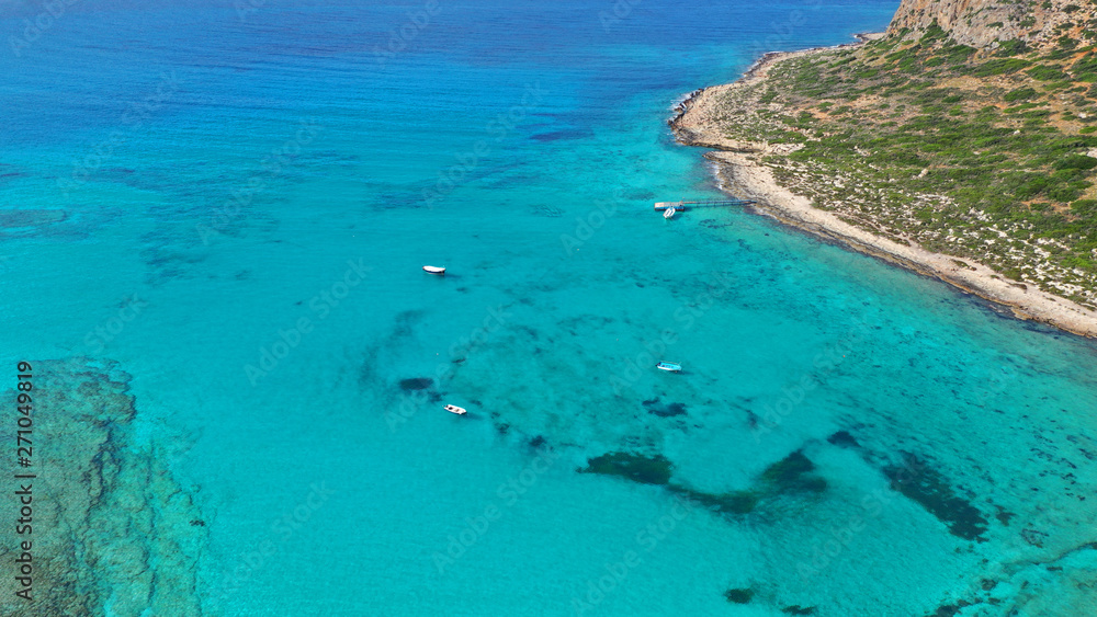 Aerial drone bird's eye view photo of tropical caribbean paradise bay and lagoon with white sandy beach and turquoise clear sea