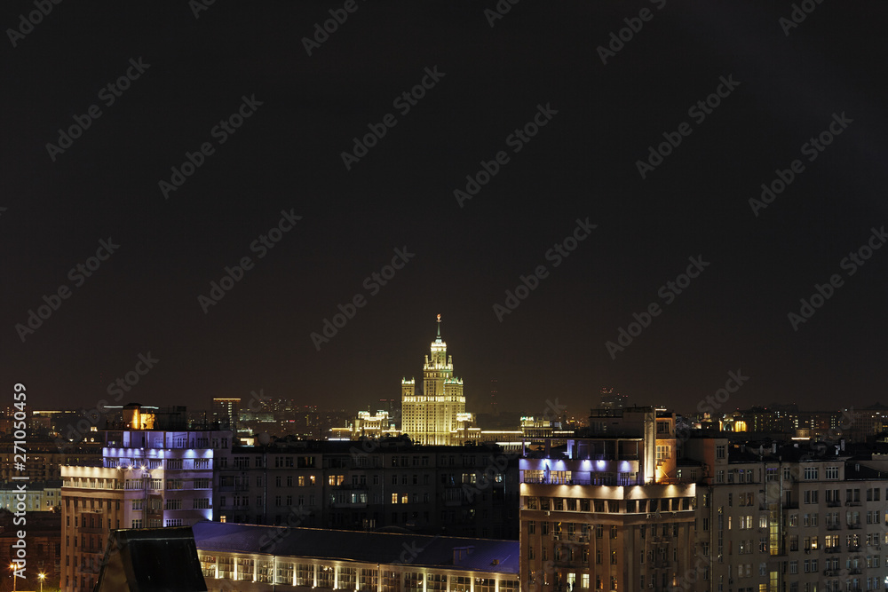 View of Moscow at night and high-rise building on the Kotelnicheskaya Embankment. One of seven Stalin skyscrapers