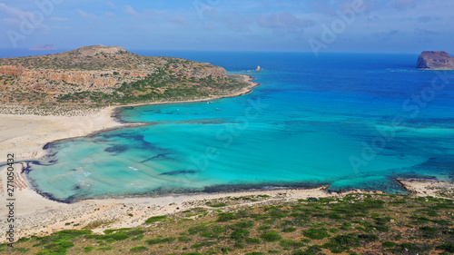 Aerial drone panoramic view of iconic azure turquoise Balos beach lagoon near Gramvousa island and pure white sand, North West Crete island, Greece © aerial-drone