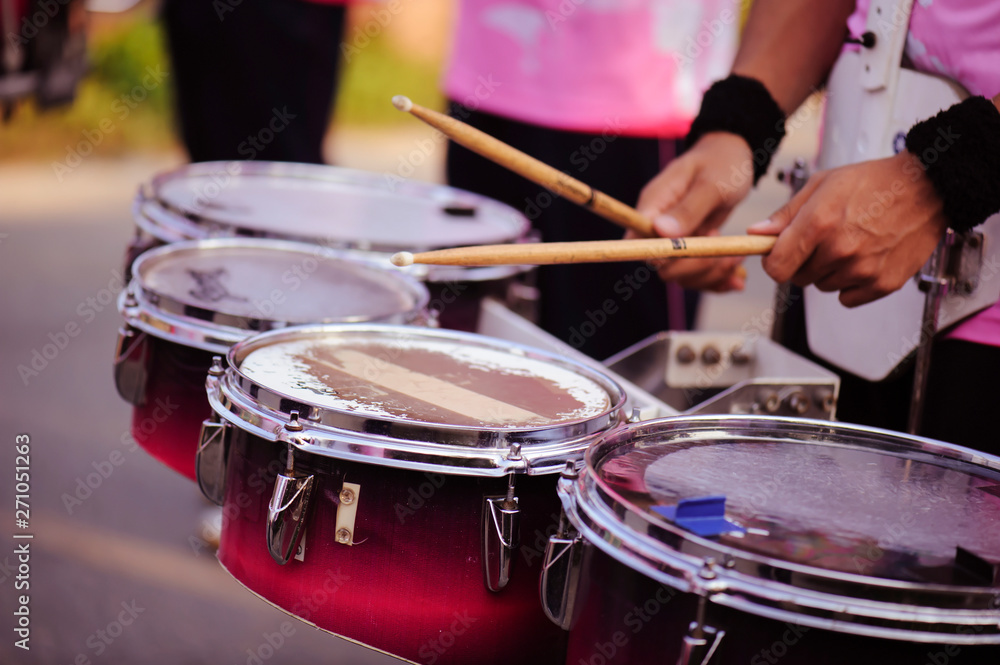 Drummer marching in Annual sports event parade Drummer marching in Annual sports event parade