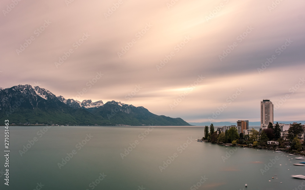 Lake Geneva and snow capped mountains in Switzerland