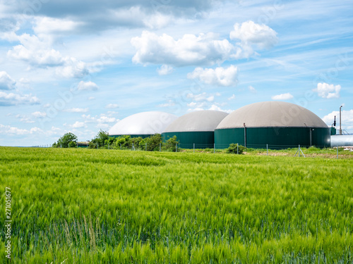 Biogasanlage in Deutschland mit Getreidefeld photo