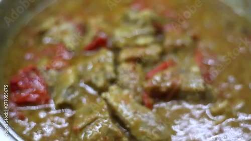 casserole with boiling meat - called tas kebap - with fresh tomatoes, vegetables and olive oil - traditional greek, turkish cuisine photo