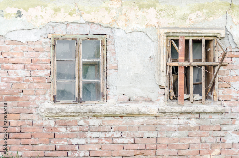 The windows of abandoned dilapidated house