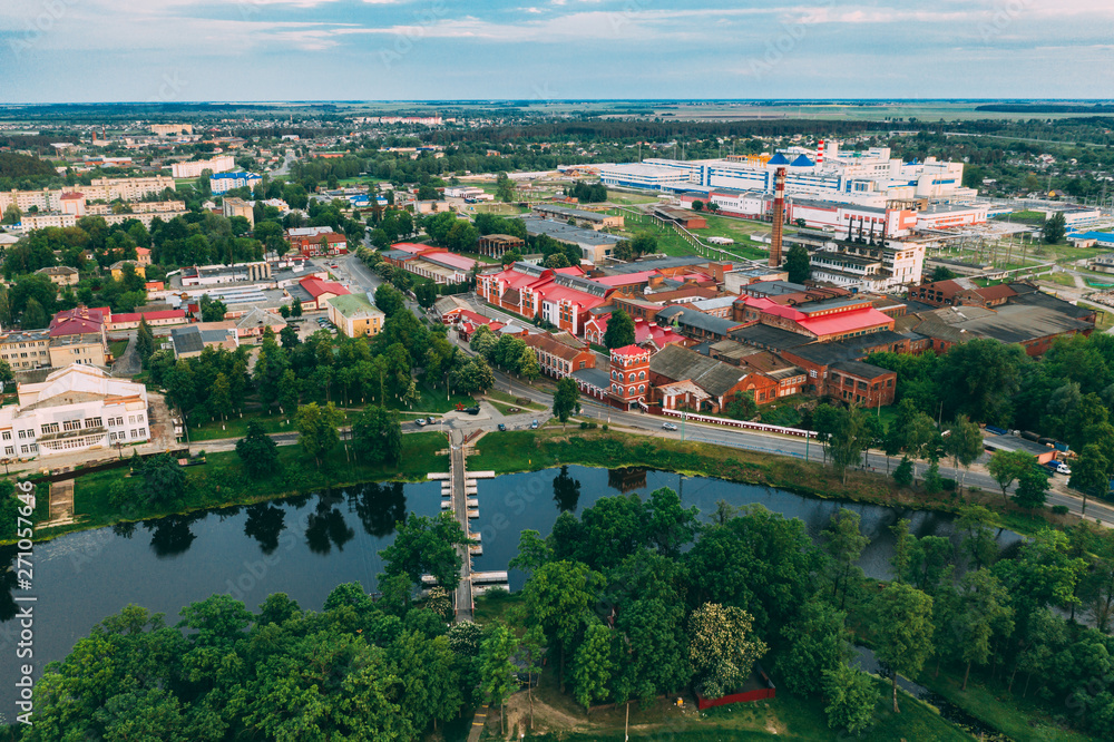 Dobrush, Gomel Region, Belarus. Aerial View Of Old Paper Factory Tower In Spring Day. Historical Heritage In Bird's-eye View