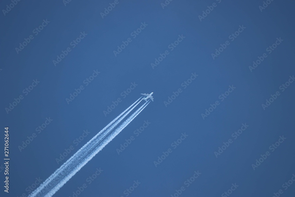 Plane flying in clear sky Plane flying in clear sky