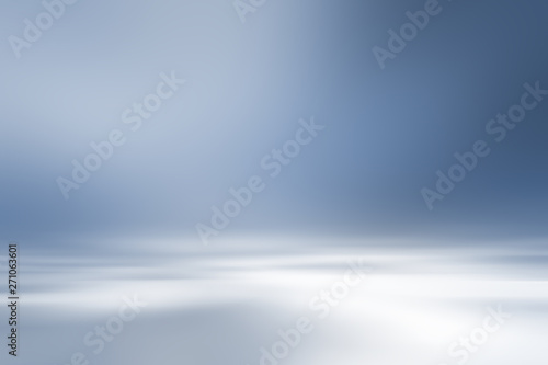 perspective floor backdrop blue room studio with light blue gradient spotlight backdrop background for display your product or artwork  photo