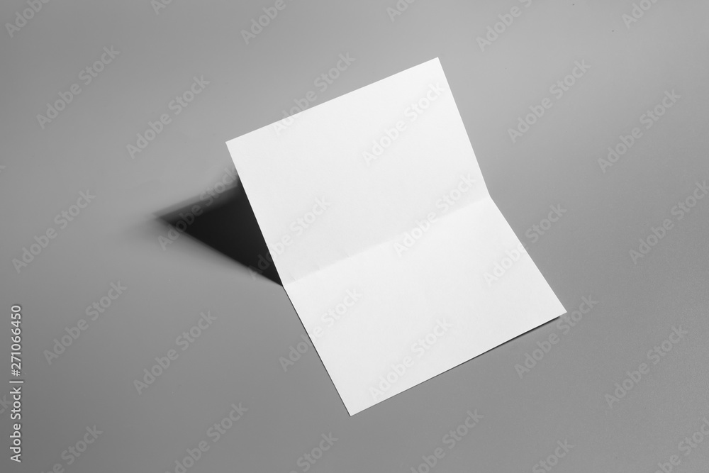 Blank portrait mock-up paper. brochure magazine isolated on gray, changeable background / white paper isolated on gray Blank portrait mock-up paper. brochure magazine isolated on gray, changeable background / white paper isolated on gray