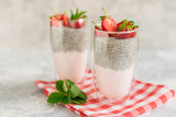 Beautiful and tasty dessert with strawberry and chia seeds. A fresh pudding with fruit for breakfast