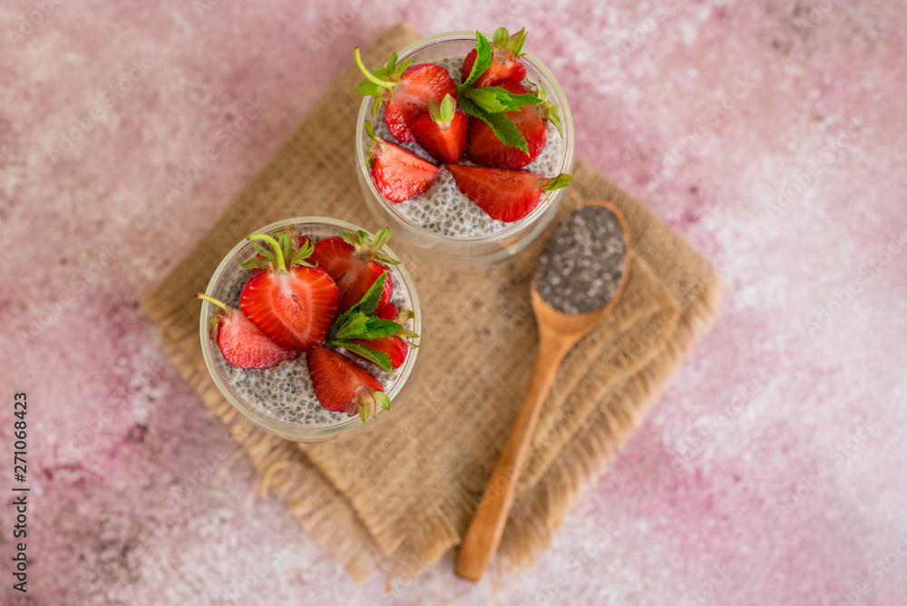 Beautiful and tasty dessert with strawberry and chia seeds. A fresh pudding with fruit for breakfast Beautiful and tasty dessert with strawberry and chia seeds. A fresh pudding with fruit for breakfast
