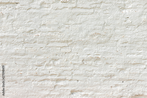 White plastered brick wall texture.