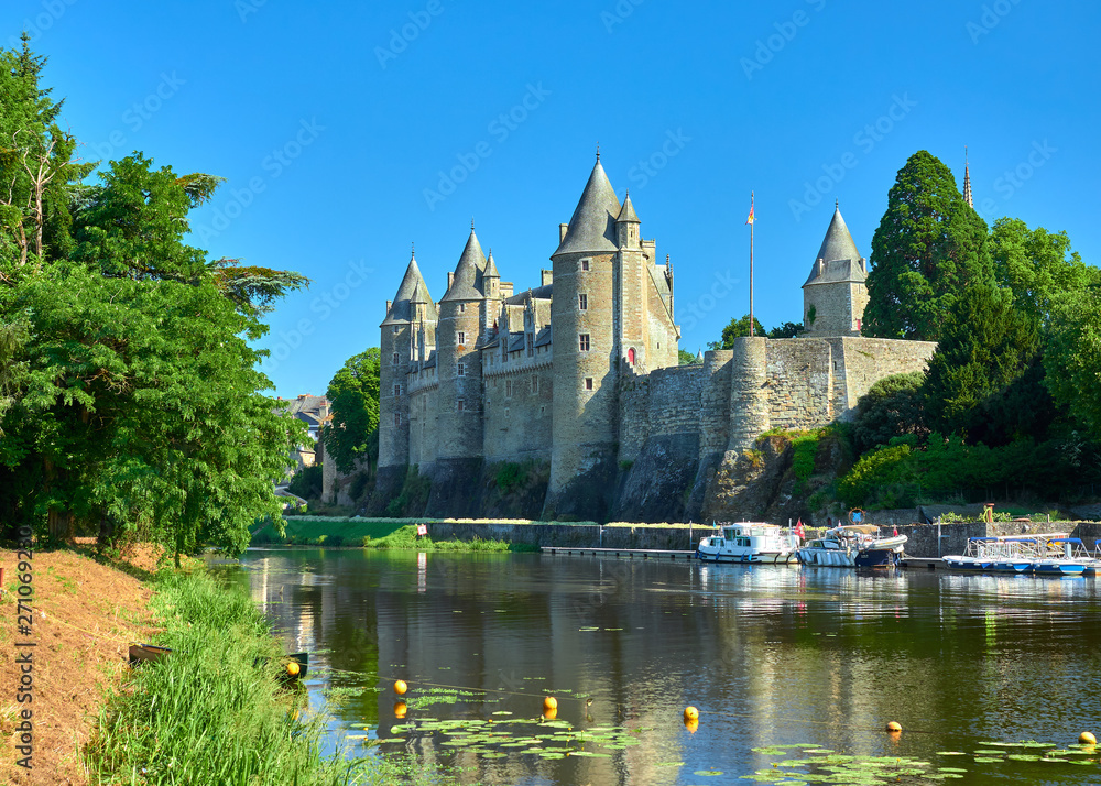 Landscape view of the of the Oust river and the chateau castle of the medieval village of Josselin, Morbihan Department, Brittany Region, France