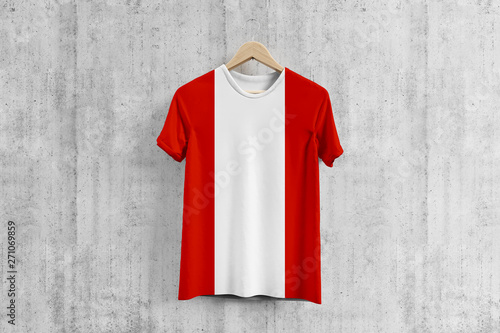 Austria flag T-shirt on hanger, Austrian team uniform design idea for garment production. National wear. © sezerozger