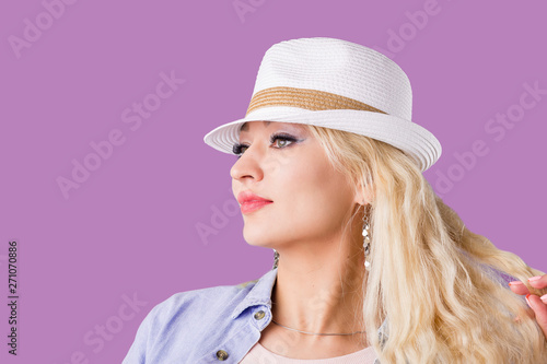 Blonde woman in straw hat