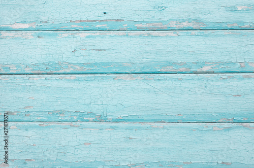 wooden horizontal boards painted blue. blue wooden background