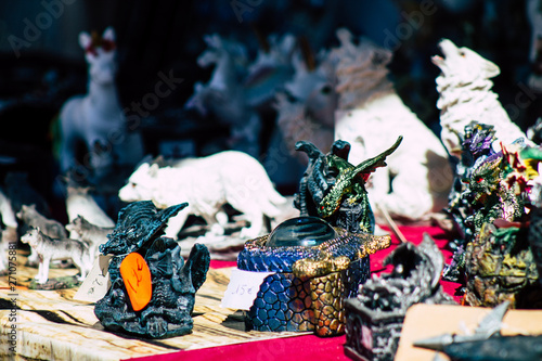 Closeup of traditional decorative objects sold in souvenirs shops in the streets of Reims in France photo