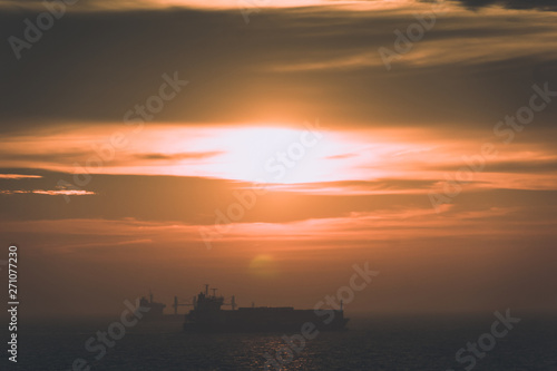 Fototapeta Naklejka Na Ścianę i Meble -  Puttgarden fehmarn sunset waterway ship