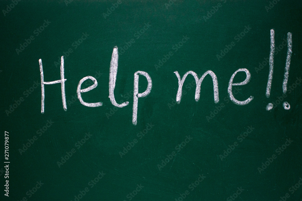 Help me !!! written on green board with chalk stick Help me !!! written on green board with chalk stick
