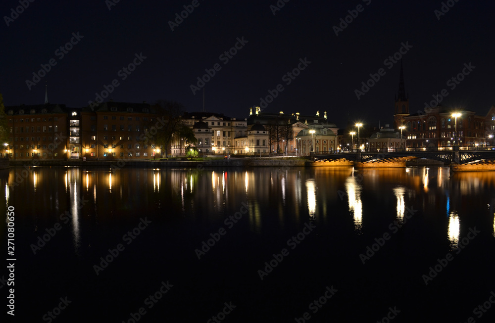 Nighttime photograph of Gamla Stan, Stockholm, Sweden, seen across water.