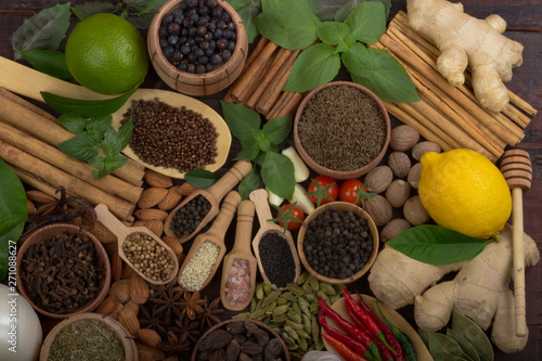Fototapeta Naklejka Na Ścianę i Meble -  various spices on wooden background