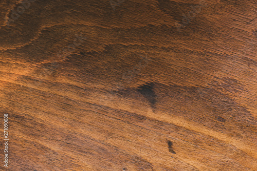 dark brown boards. the distance between the wooden planks. wooden beautiful texture.