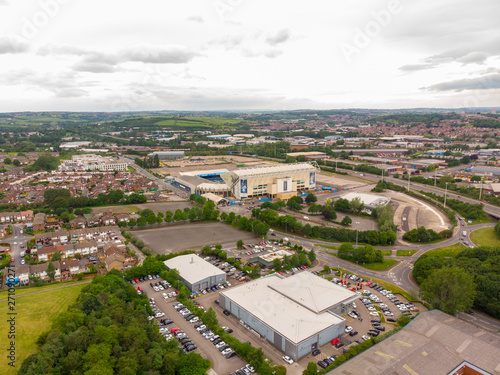 Aerial photo over looking the whole of Leeds from the Beeston area of the City Centre in West Yorkshire, the photo also shows the Elland Road Leeds United football stadium in the background.