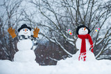 Snowman couple in love have fun Christmas or New Year. Trust in love. Enjoying nice weekend together. Romantic portrait of a sensual Snowman couple in love. Group of snowman celebrating new year.