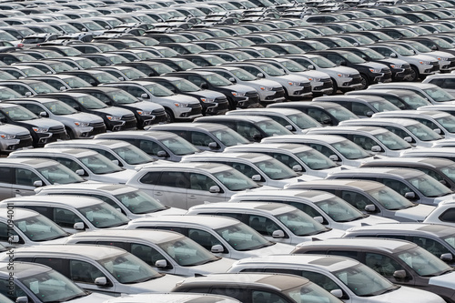 Row of new cars for sale in port