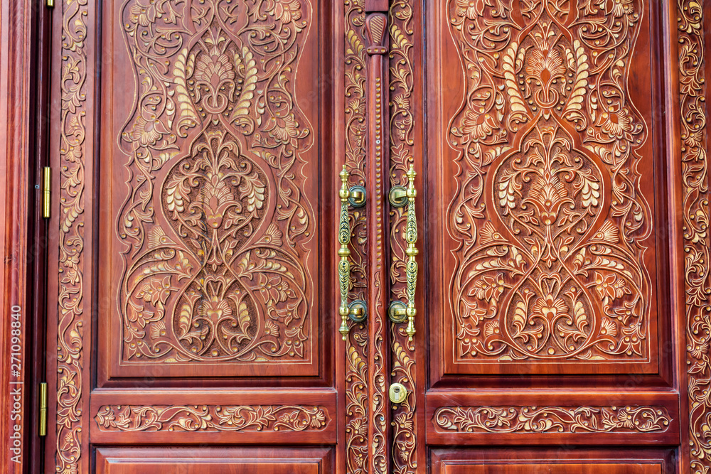 Fototapeta Ancient Wooden Door with Golden Door Handle