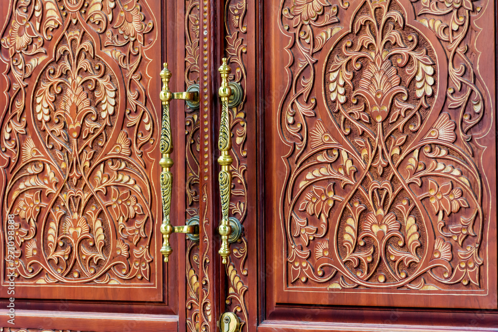 Ancient Wooden  Door with Golden Door Handle 